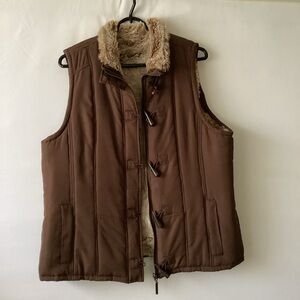 Unbranded sleeveless Vest with Faux Fur Lining. Can be worn on both sides.